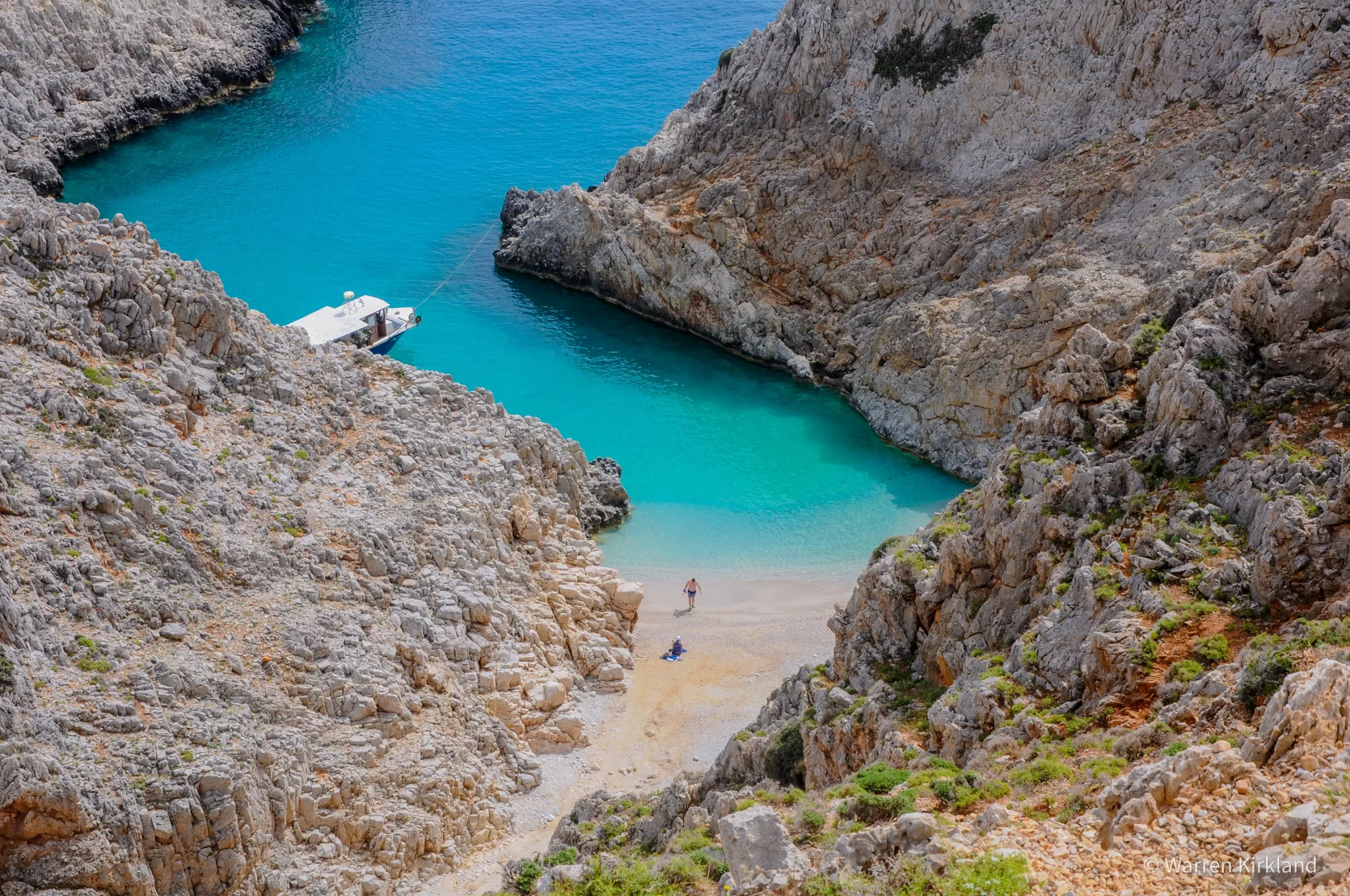 Aerial view of Seitan Limania Beach's turquoise cove, Crete, Greece