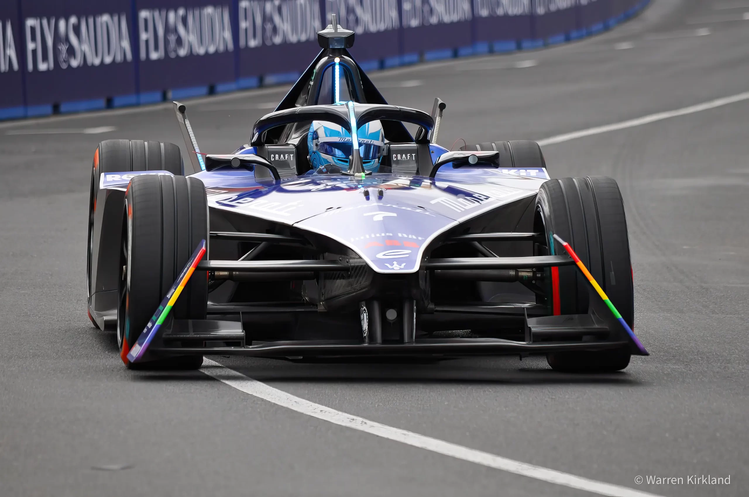 Front-on shot of a Formula E car on a street circuit