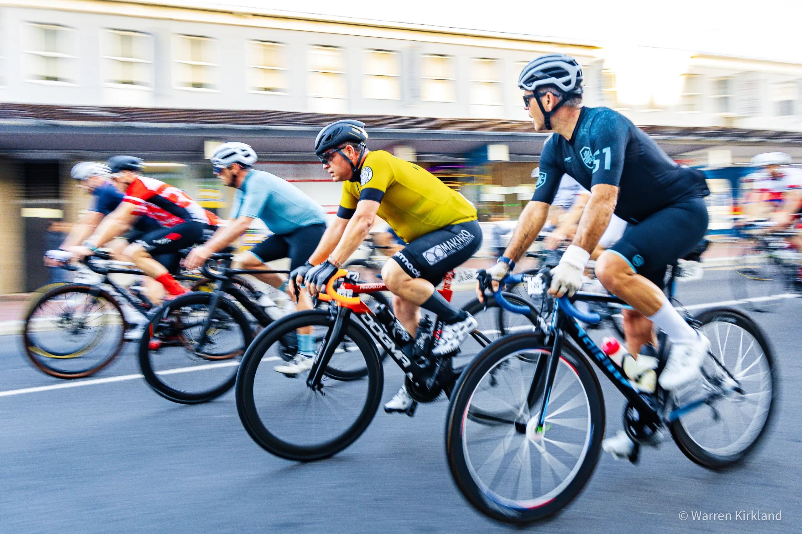 Cyclists riding in a pack through the city, Cape Town Cycle Tour