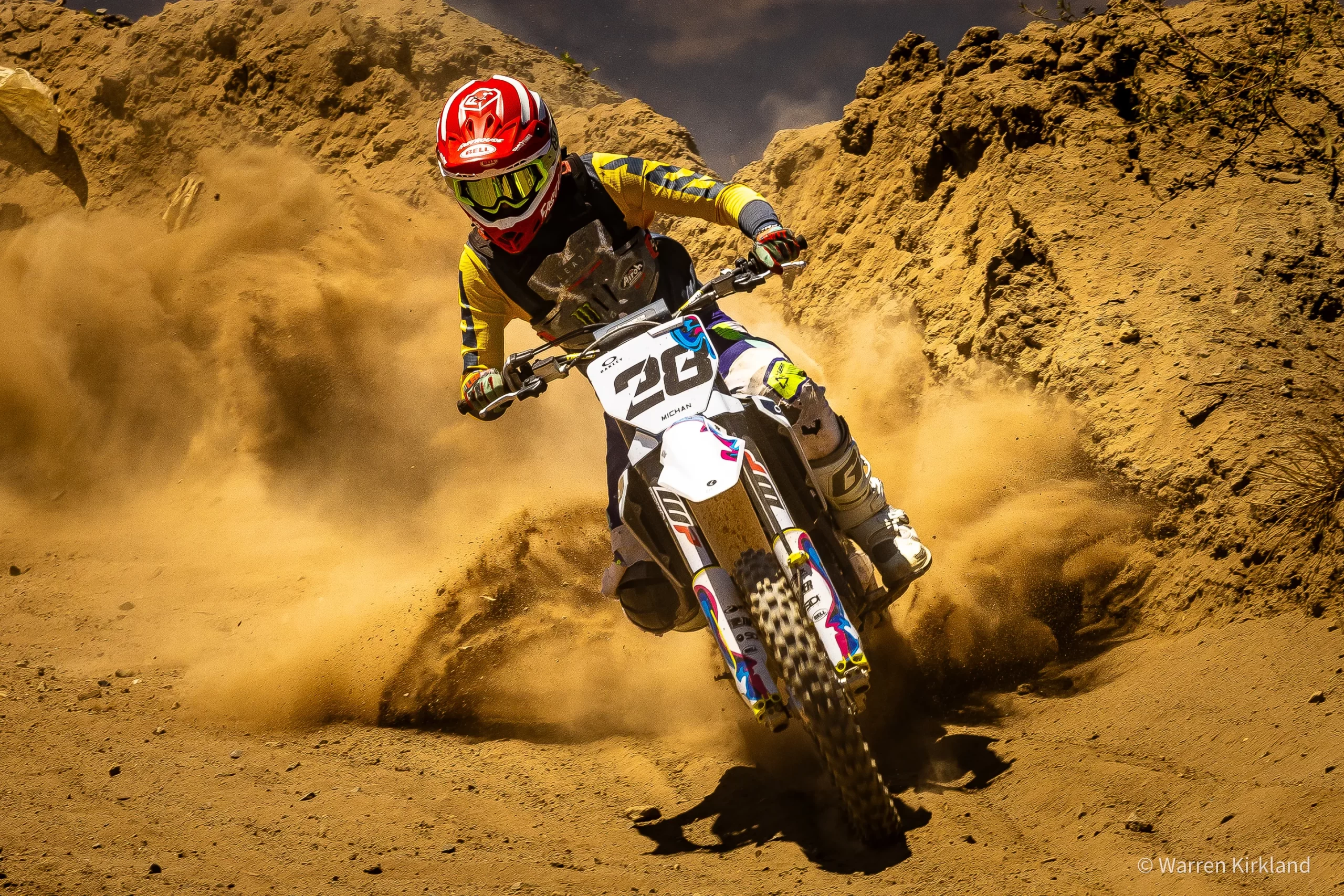 Sports photographer Cape Town capturing a motocross rider kicking up dust at the National Motocross Championships