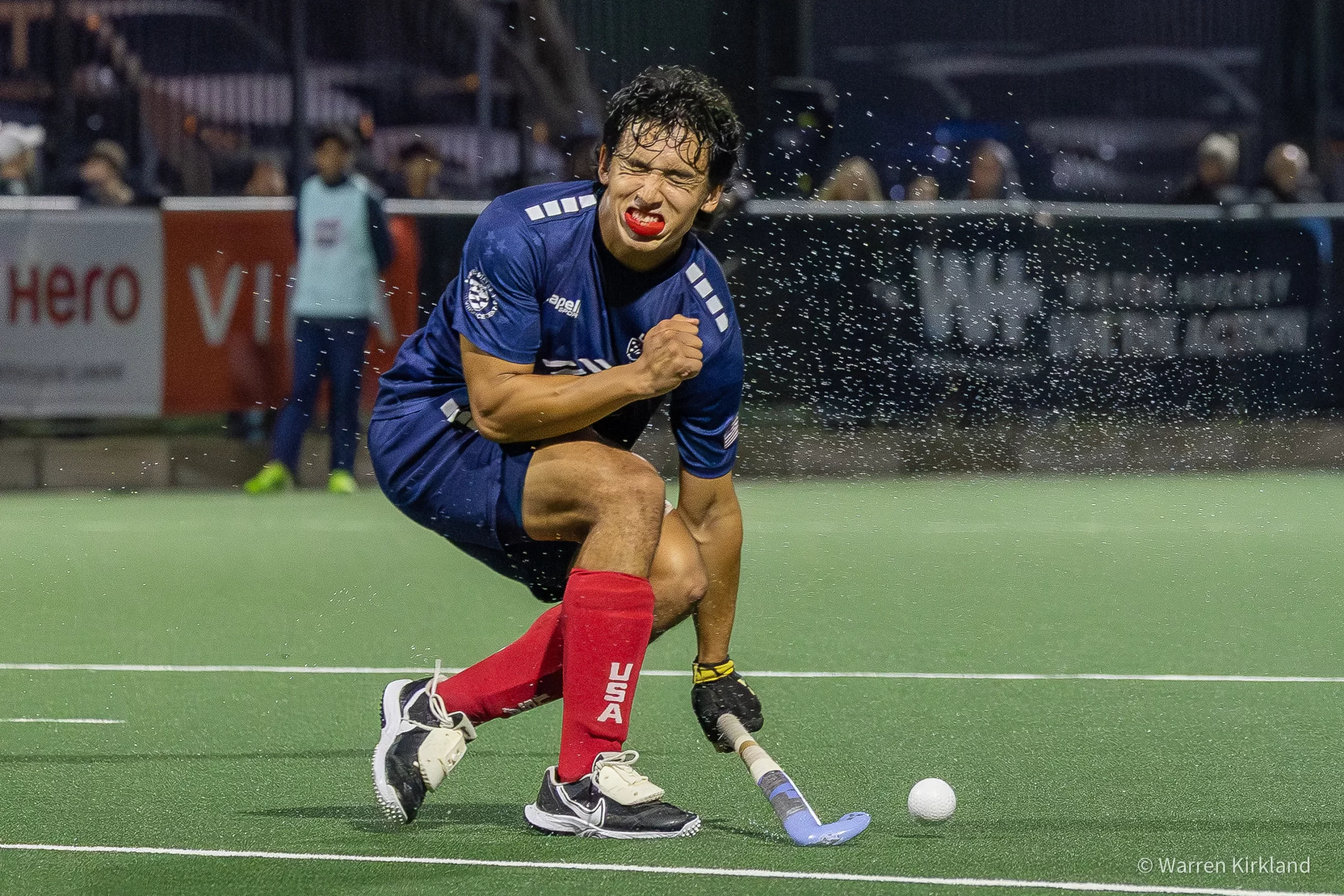 USA hockey player reacting intensely with clenched fist, FIH Hockey Men's Nations Cup