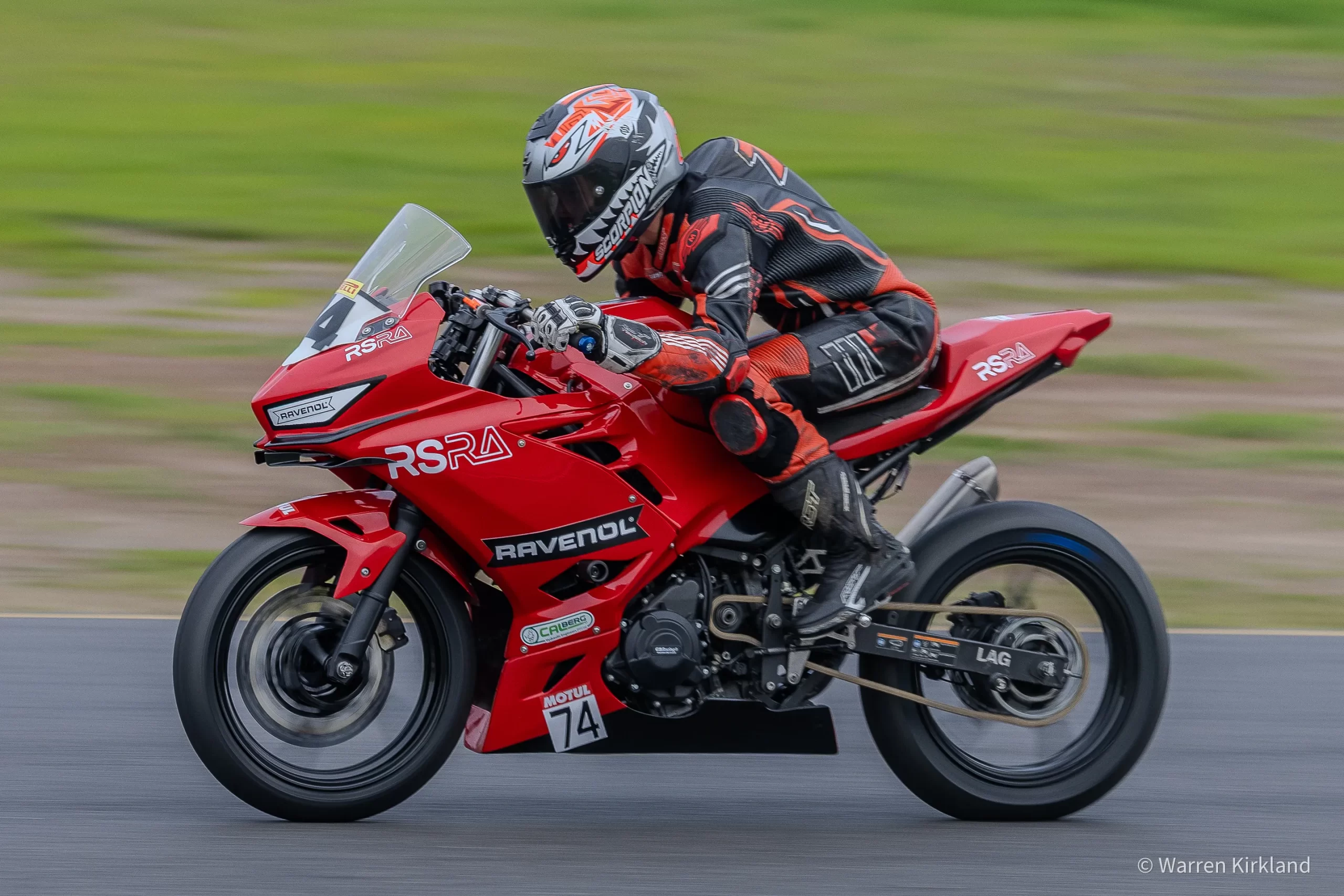 Red superbike racing down the straight, Power Series