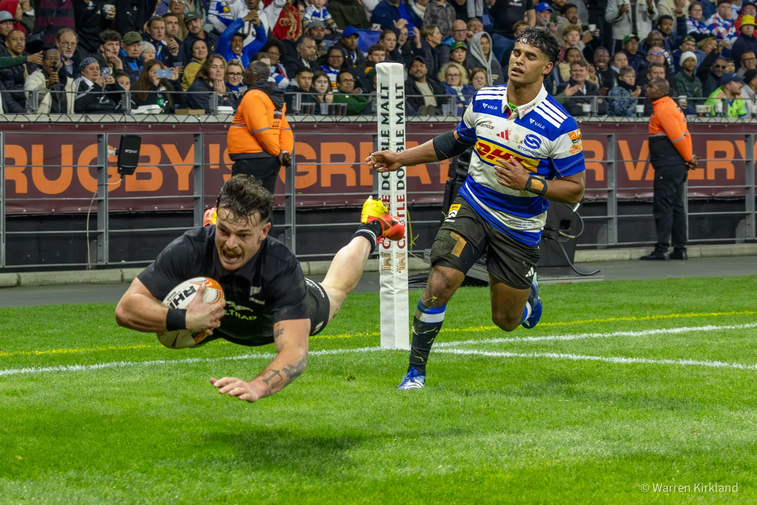 Cape Town sports and event photographer capturing an All Blacks player scoring a touchdown, Stormers vs All Blacks match, DHL Stadium